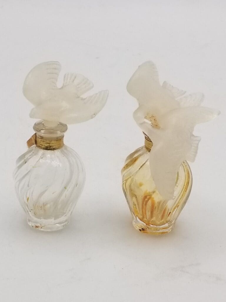 Pair of Vintage Nina Ricci Tiny Lair Du Temps Glass Perfume Bottles with Plastic Dove Stoppers, Empty