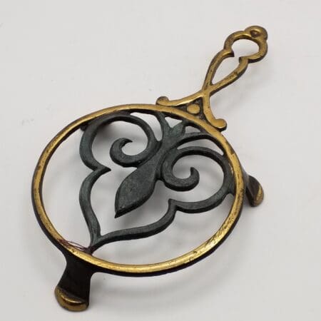 Vintage Cast Iron and Brass Trivet, with Maker's Mark (see photo)